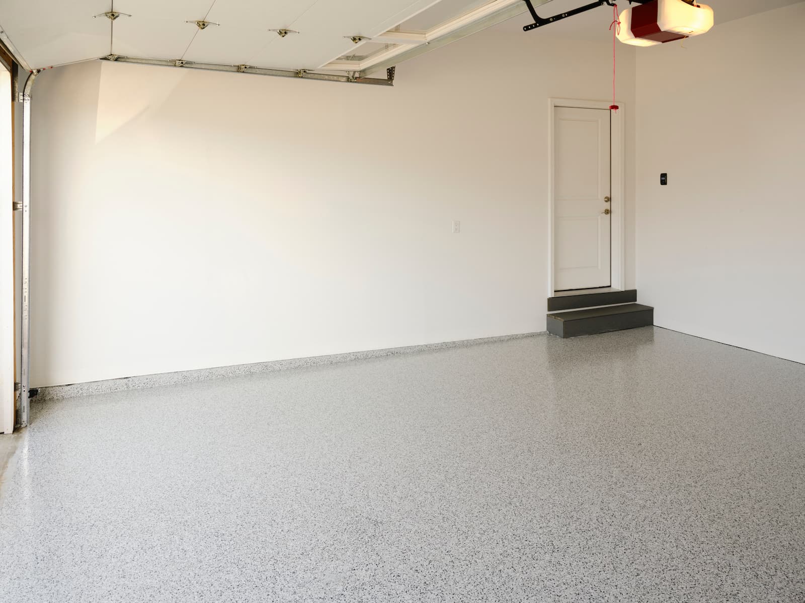 epoxy garage done Why Your Garage May Benefit from an Epoxy Concrete Coating