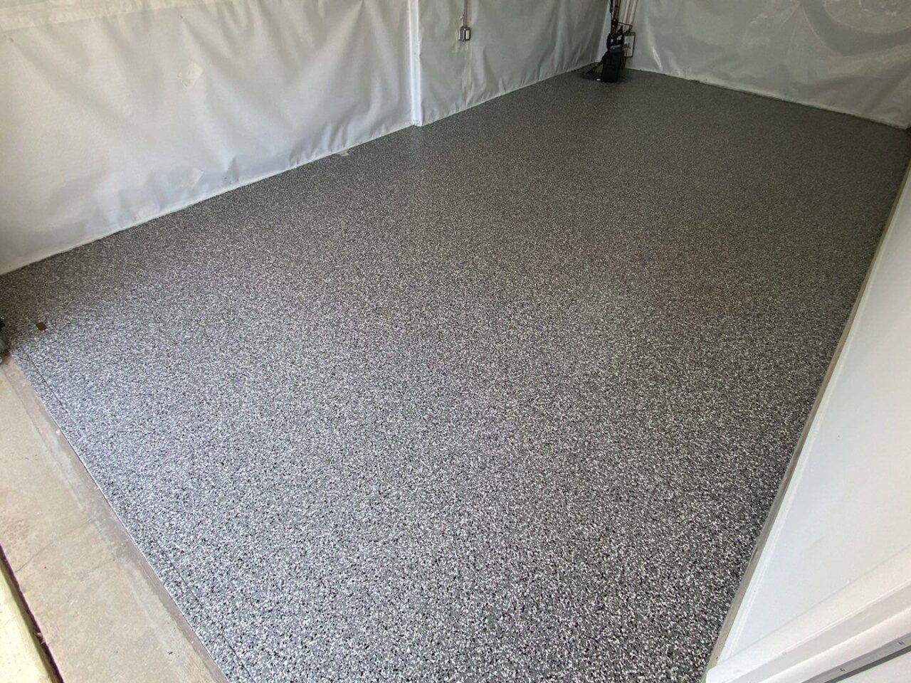 domino flake epoxy garage floor coating side view