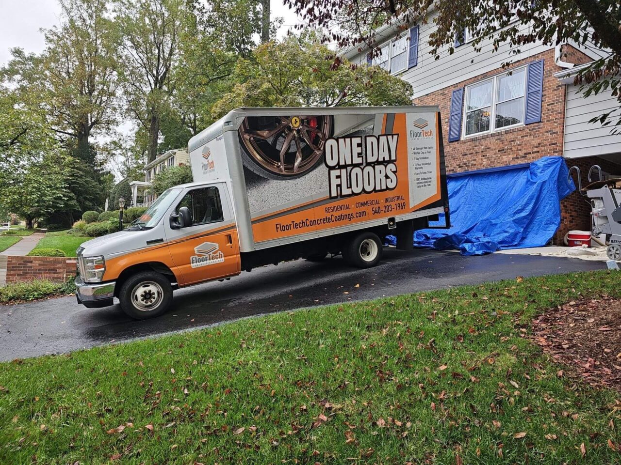 FloorTech Concrete Coatings truck parked outside a Tysons, VA home during a garage floor coating project