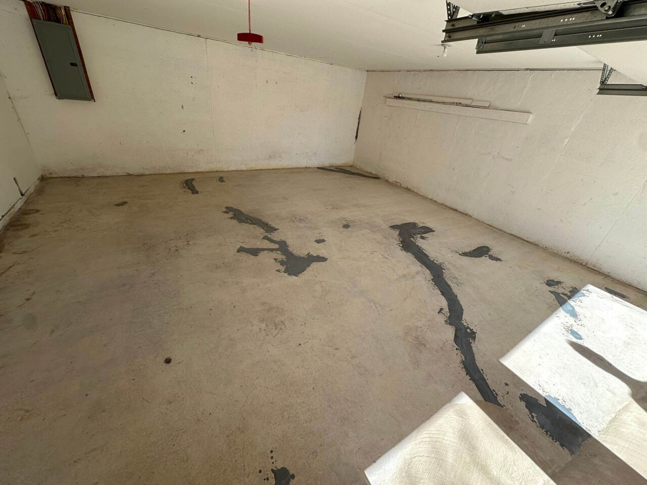 repaired concrete floor of a garage home in west springfield