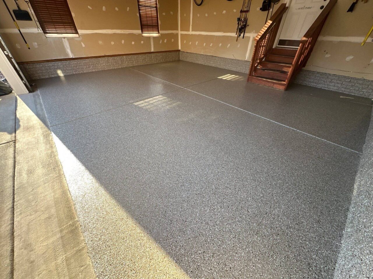 Side angle of finished floor showing uniform flake coverage and neat edge work.